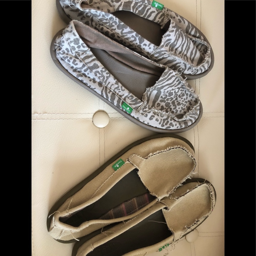 Lot of two woman’s Sanuk slide on shoes